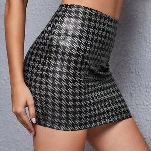 Stylish black and grey skirt.